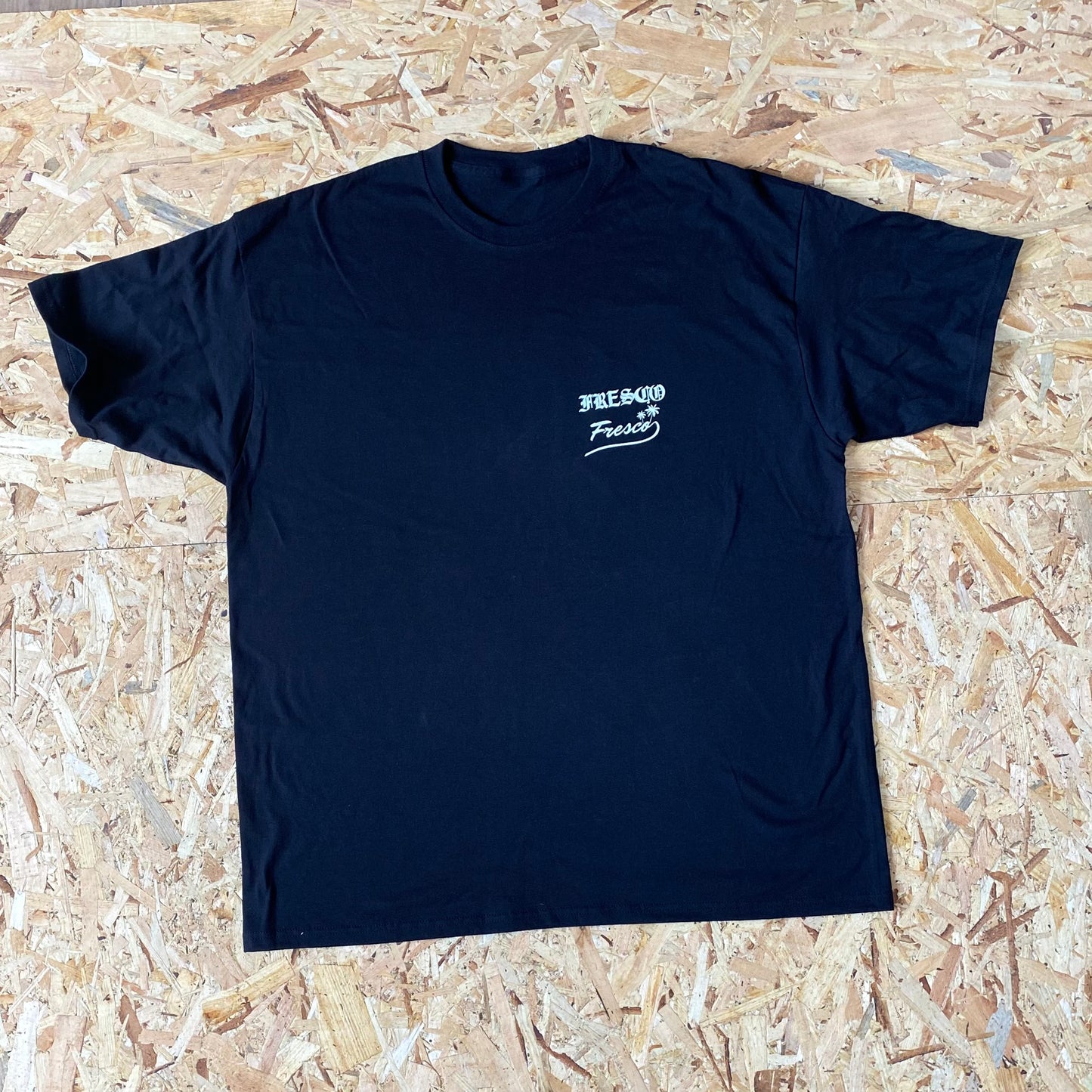 Kiwi Black Tee